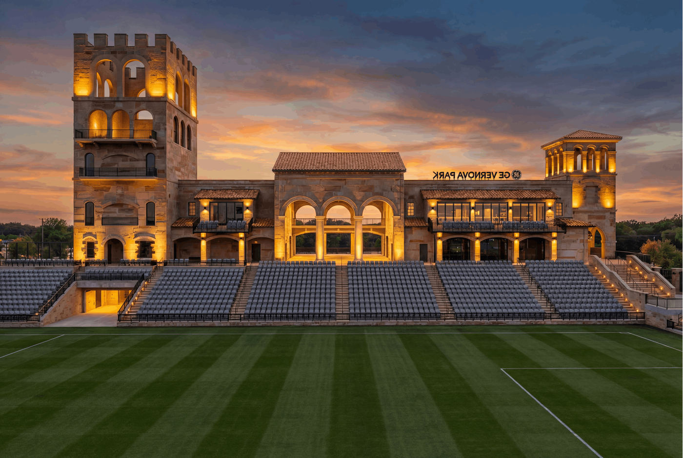Render of the west building at GE Vernova Park from midfield, with the VIP Midfield rows in front of it